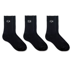 Cute monogrammed gift sock set for men with classic monogram styling personalized with your own initials for the person who has literally everything you can get the these amazing unique socks so they can stand out in a crowd and feel special to you.