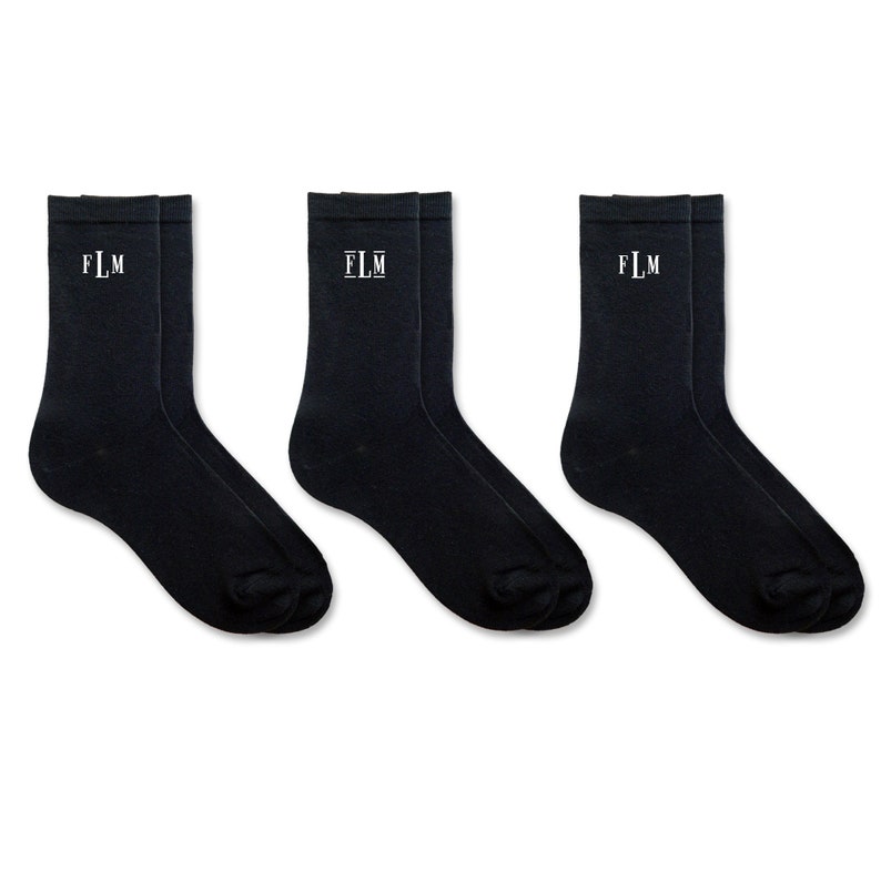 Cute monogrammed gift sock set for men with classic monogram styling personalized with your own initials for the person who has literally everything you can get the these amazing unique socks so they can stand out in a crowd and feel special to you.