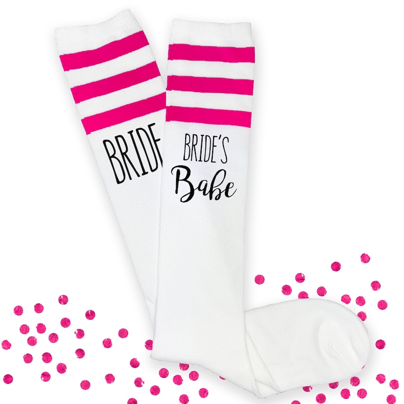 Fun socks for events related to a wedding.  Your choice of designs for the bride or her wedding party, brides babes with the designs digitally printed on the side of each pair of our comfy cotton knee high socks.