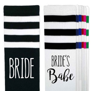 Fun socks for events related to a wedding.  Your choice of designs with bride or her wedding party, brides babe, with the designs digitally printed on our comfy cotton knee high socks available in several color choices.