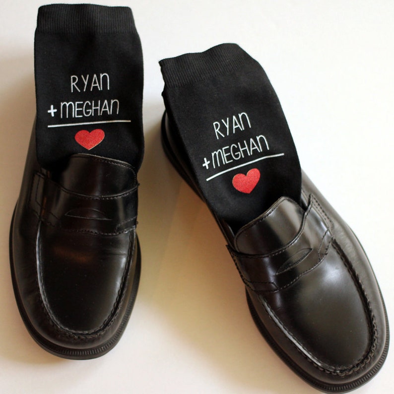 pair of long black color socks print name and heart image is the best valentine gift for him