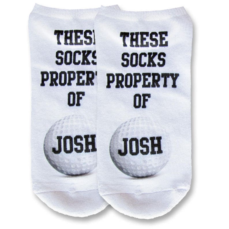 Custom printed and personalized with your name or initials these golf theme design digitally printed in ink on white cotton no show footie socks make the perfect tee tournament gifts.