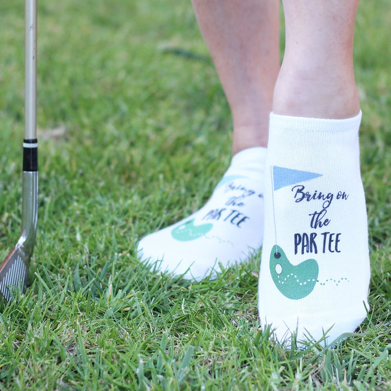 These stylish white cotton no show footie socks custom digitally printed with bring on the par tee golf design make the perfect tournament tee gifts or party favors or just wear them when you golf and show them off around the country club!