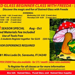 May include: A yellow and red advertisement for a stained glass beginner class with Freeda. The ad includes class times, a summer special, and contact information. A stained glass mushroom with a frog is in the corner.
