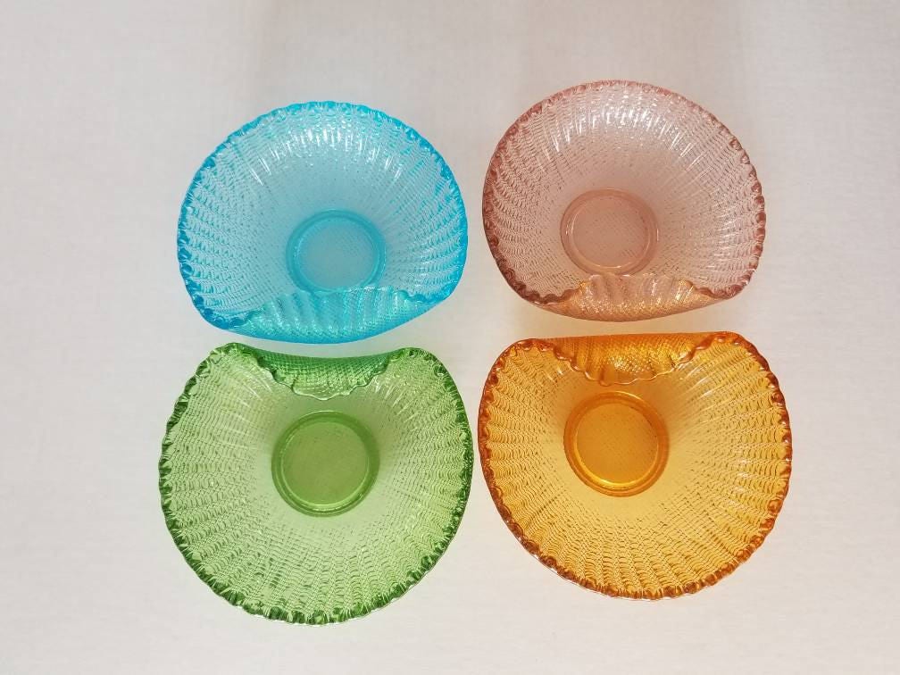 Vintage glass bowls. Assorted colored dishes. Victorian style glassware