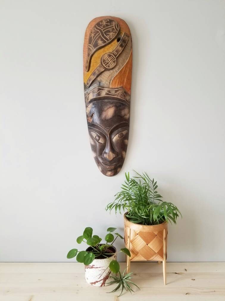 Vintage carved African mask wall decor statement piece