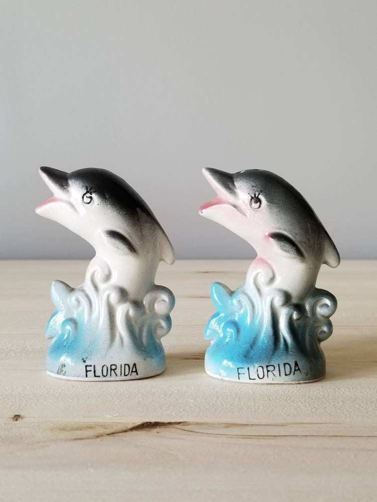 Vintage salt and pepper shakers Florida travel souvenir dolphin salt and pepper shakers