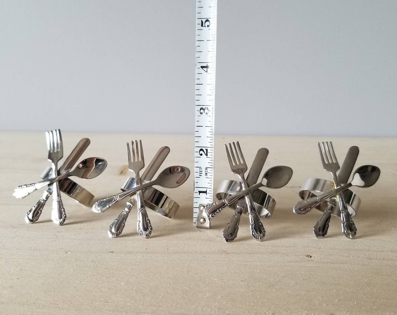 Vintage silver plate fork knife and spoon napkin rings