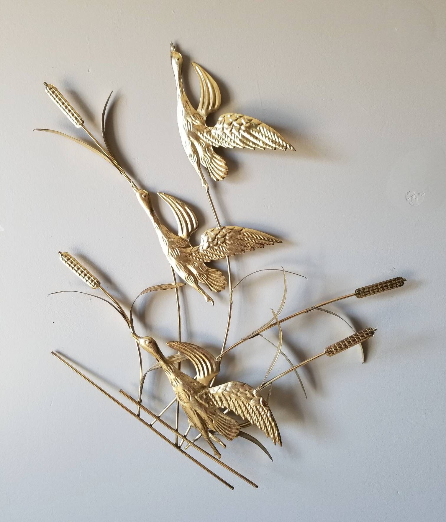 Vintage metal wall sculpture with birds and reeds wall decor