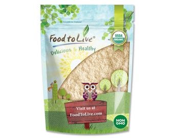 May include: A stand-up pouch of Food to Live brand product featuring a clear window showing beige contents. The packaging displays a cartoon owl, trees, and a red sign with the text Visit us at FoodToLive.com, USDA Organic, and Non GMO labels.