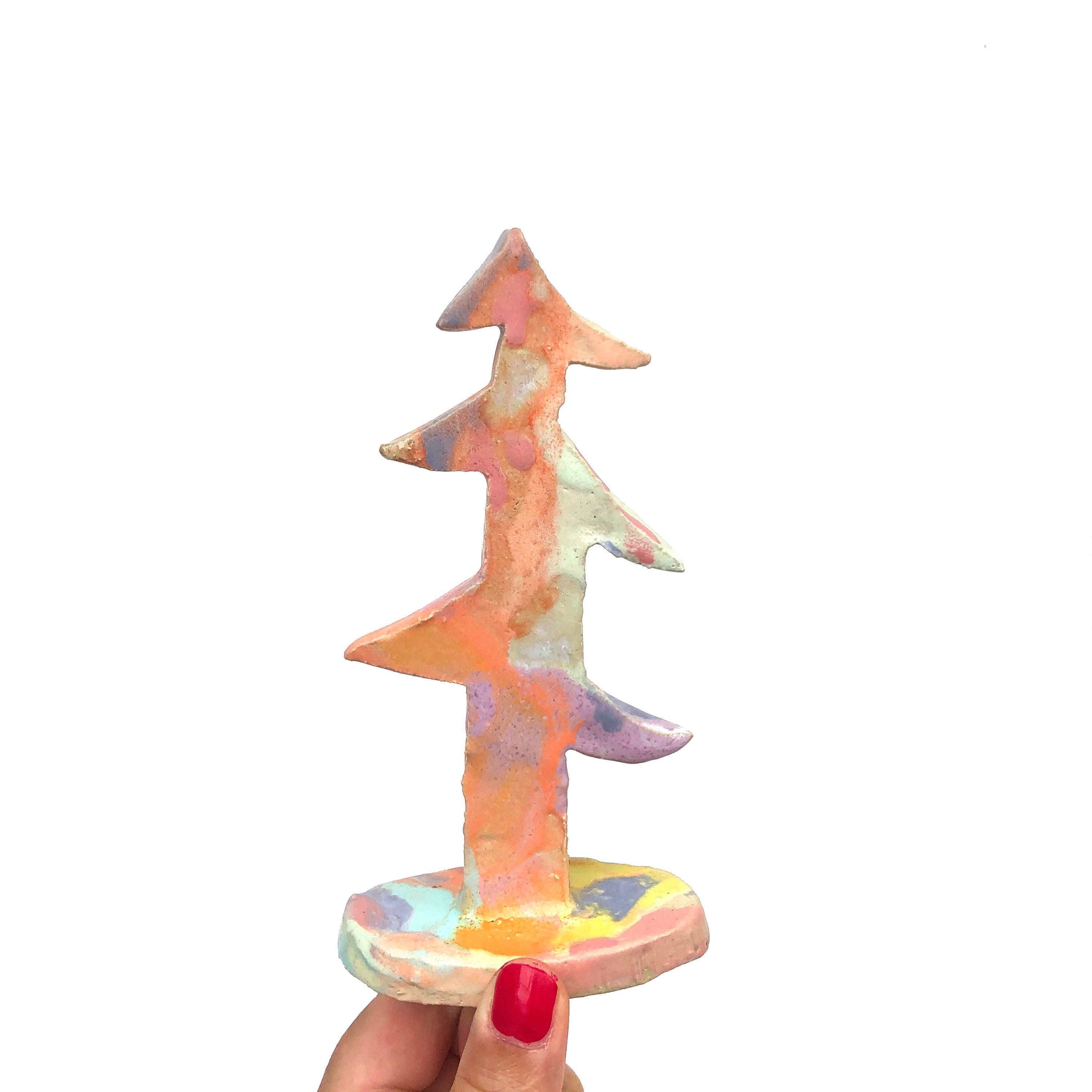 Buy a ceramic tree. This fun and charming tree will be a Etsy