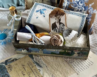 Vintage Courtship tin.Most likely made to contain sweets or chocolates during courtship.