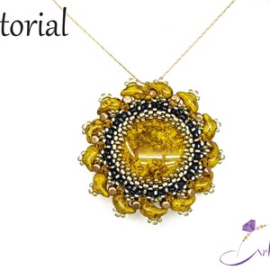 May include: A gold chain necklace with a beaded pendant in the shape of a sun. The pendant is made with black, gold, and yellow beads.