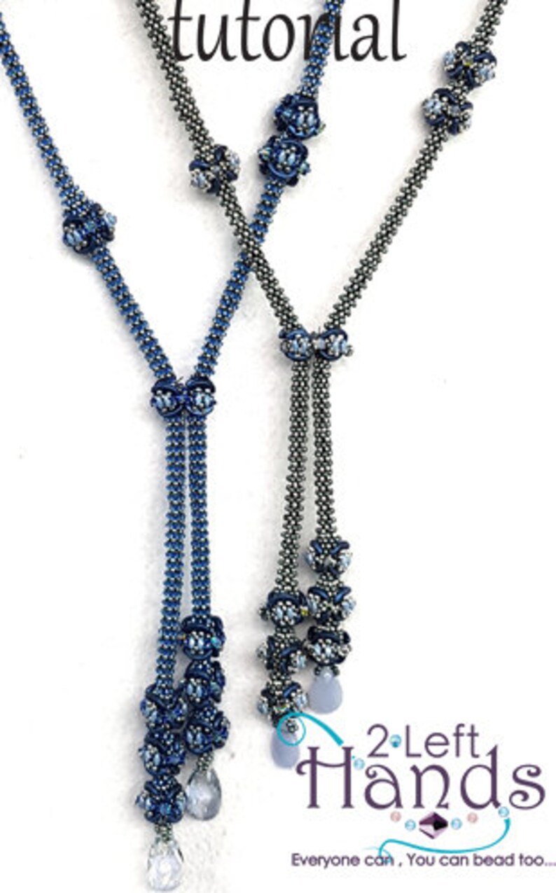 May include: Two beaded necklaces with blue and silver beads, featuring a floral design. The necklaces are tied together at the bottom with a knot. The image includes the text "2 Left Hands" and "Everyone can, You can bead too."