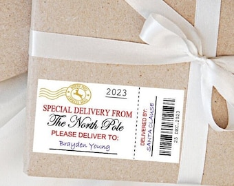 May include: Two wrapped gifts with kraft paper and white ribbon. Each package has a label that reads "Special Delivery From The North Pole" with the recipient's name and "Delivered by: Santa Clause". The year 2023 is also printed on the label.