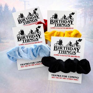 May include: A set of three ceramic mugs with a speckled, matte finish. Each mug features a different color: light blue, cream, and gray. The mugs have a simple, modern design and a comfortable handle.