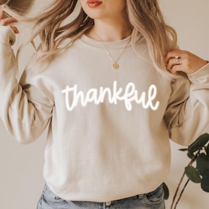thankful Sweatshirt | Thanksgiving Sweatshirt | thankful puff text | Holiday Sweatshirt | Unisex Heavy Blend™ Crewneck Sweatshirt