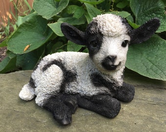 Spotted Baby Lamb Lying Down Yard Ornament Resin Figurine Statue Farmyard Decoration Realistic Qualities Indoor/Outdoor Black/ 9x 6 inches