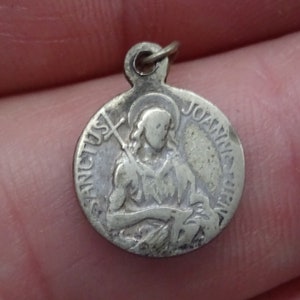 Religious antique silvered French medal pendant of Saint John the Baptist,Sanctus Joannes Medallion, Patron Saint of Love.( 26 Q )