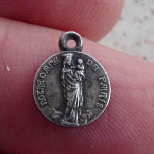Religious antique silvered catholic medal pendant Holy charm medallion of Holy Virgin Mary of Notre Dame de Paris and the cathedral. P 33