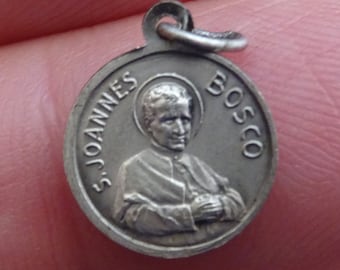 Religious silvered antique catholic pendant Holy charm medallion medal of Saint Dominic Savio and  Saint John Bosco.  ( 17 )