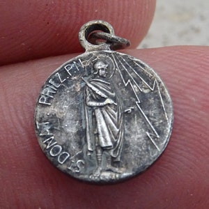 Religious antique silver ( MARKED ) catholic medal pendant medaillon Holy charm medallion of Saint Donat. ( O 11  )