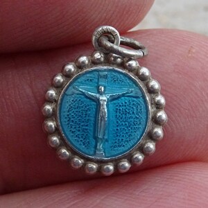Religious antique silvered enameled medal pendant charm medallion of Holy Christ Cross of Tancremont a pilgrimage town in Belgium. ( T 20  )