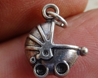 Vintage silver plated French medal pendant medaillon charm medallion of a pram pusher. ( A 8 )