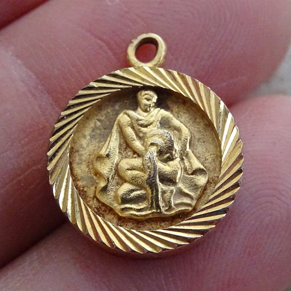 Vintage silvered vermeil gold plated ( MARKED ) Zodiac constellation medal charm medallion pendant sign of Aquarius. ( waterman ) A 23