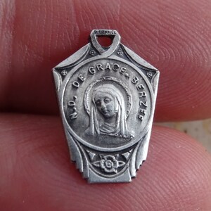 Religious antique silver plated catholic medal pendant Holy charm medallion of Holy Virgin Mary souvenir of Berzee and Holy Christ.  M 31