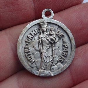 Religious antique silvered catholic medal pendant Holy charm medallion of Holy Virgin Mary of cathedral Notre Dame de Paris. (  9 )