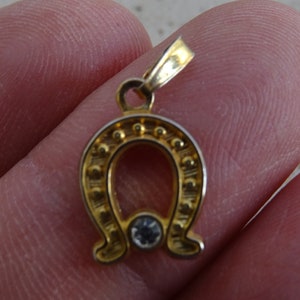 French vermeil talisman medal charm medallion pendant of a horse shoe of a horse with transperant stone.  ( 16 )