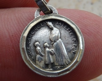 Antique French silvered medal pendant Holy charm medallion of Holy Virgin Mary souvenir of la Salette. ( M 34 )