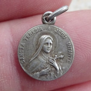 Religious antique French silver ( MARKED ) catholic medal pendant Holy charm medallion of Saint Therese of Lisieux. ( 11 )