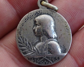 Religious antique French silver ( MARKED ) medal charm pendant medallion of Saint Jeanne d'Arc Joan of Arc with palm sprig.  ( P 1 )