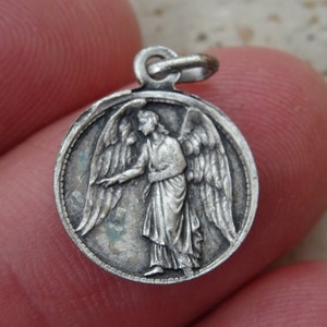 Religious antique catholic silver plated medal pendant charm medallion of Saint Michael the Archangel Saint Michel and Saint Anna. ( 19 )