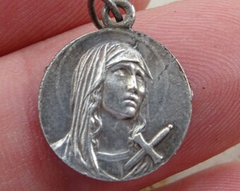 Antique silver plated  French medal pendant medallion charm of calvaire de Joliment and woman with sword.  ( Q 17 )