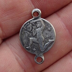 Vintage silvered Zodiac constellation medal charm medallion pendant sign of Aquarius. ( waterman ) 16