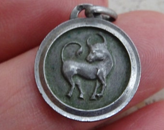 Vintage silver ( MARKED ) Zodiac constellation medal pendant charm medallion sign of Taurus. ( bull ) A 22