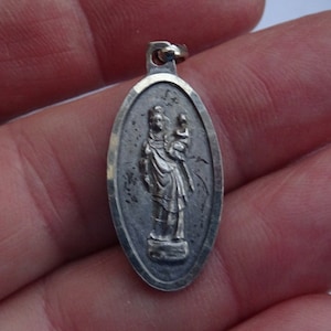 Religious antique silvered catholic medal pendant Holy charm medallion of Holy Virgin Mary of Notre Dame de Paris. ( 6 )