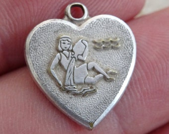 Vintage silvered Zodiac constellation medal charm medallion pendant sign Aquarius. ( waterman )  ( 9 )