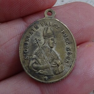 Religious antique French catholic copper medal pendant medallion medaille medaillon of Saint Ghislain.  ( P 22 )