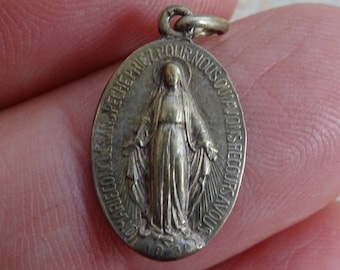 Religious antique silver ( MARKED ) charm medallion pendant miraculous medal of Immaculate Conception of Holy Virgin Mary of Graces. D 9 TM