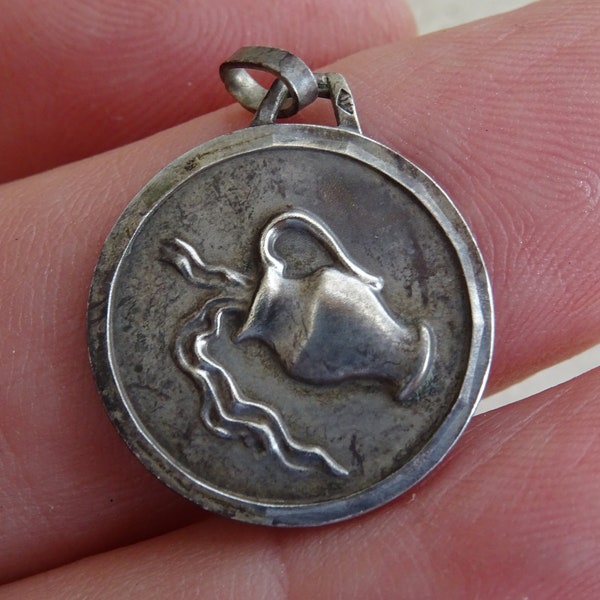 Vintage silver ( MARKED ) Zodiac constellation charm medal medallion pendant sign of Aquarius. ( waterman )  D 6
