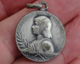 Religious antique French silver ( MARKED ) medal charm pendant medallion of Saint Jeanne d'Arc Joan of Arc with palm sprig.  ( K 11 )