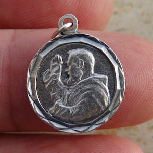 Religious silver plated catholic medal pendant charm medallion of Father Padre Saint Pio and his Stimata and Holy Mary Perpetual Help.  Q 6
