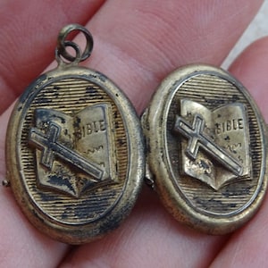 Religious antique catholic silver plated shrine relic medal locket reliquary with cross crucifix and bible.( P 11 )