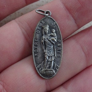 Religious antique silvered catholic medal pendant Holy charm medallion of Holy Virgin Mary and the cathedral of Notre Dame de Paris. ( 15 )