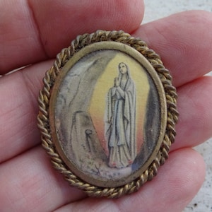 Religious antique French copper catholic brooch of Holy Virgin Mary souvenir of Lourdes. ( K 7 )