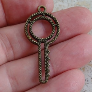 Antique French Bronze Key Charm Pendant Brass Skeleton Key. ( 8 )